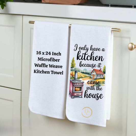 Two kitchen towels hanging on a rack with text and graphics.