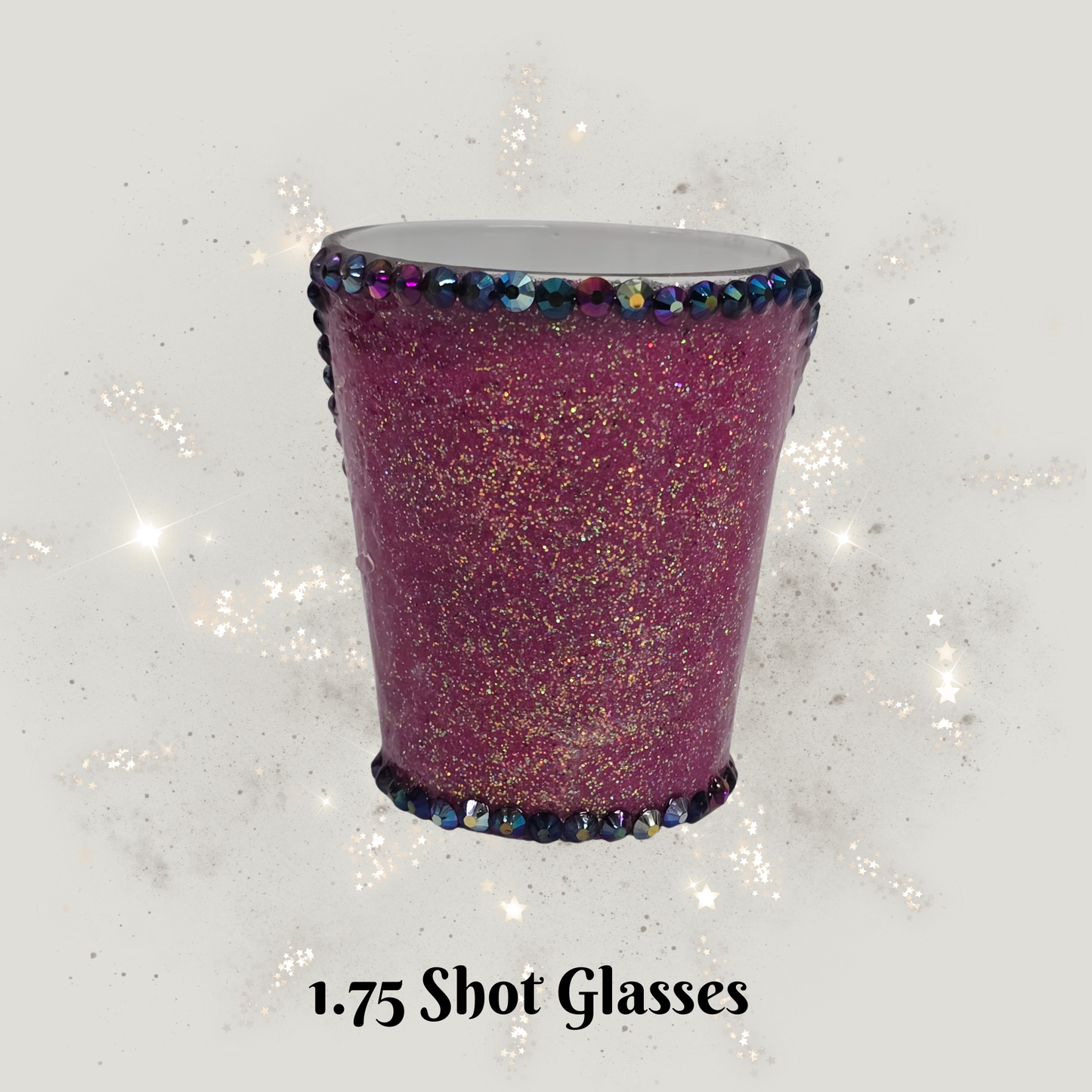 Purple glittery shot glass with decorative rim on a sparkly white background