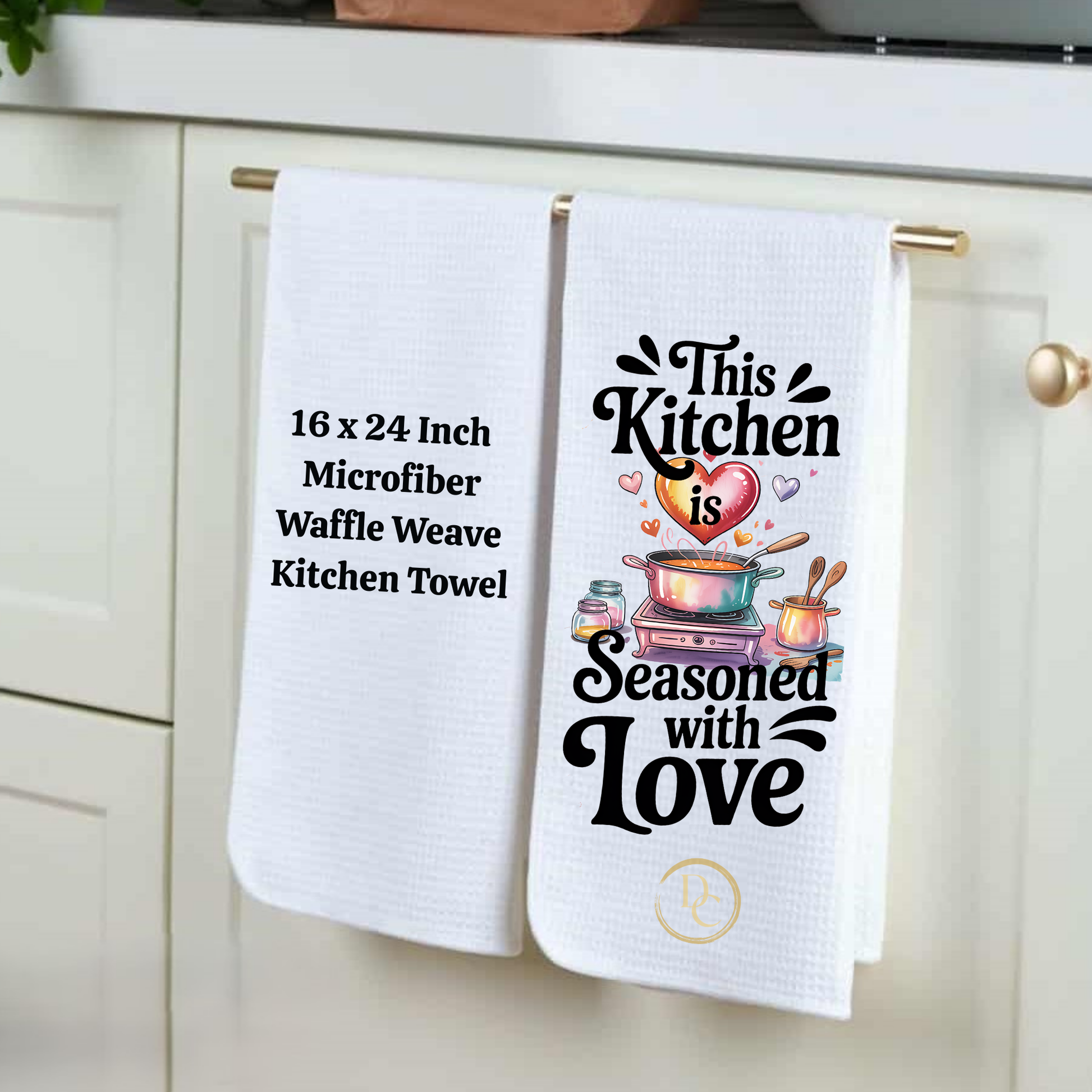 Two kitchen towels hanging on a rack with text and graphics.